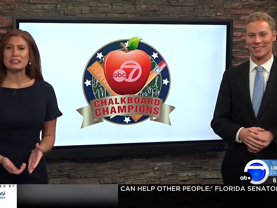 A man and a woman on a news show