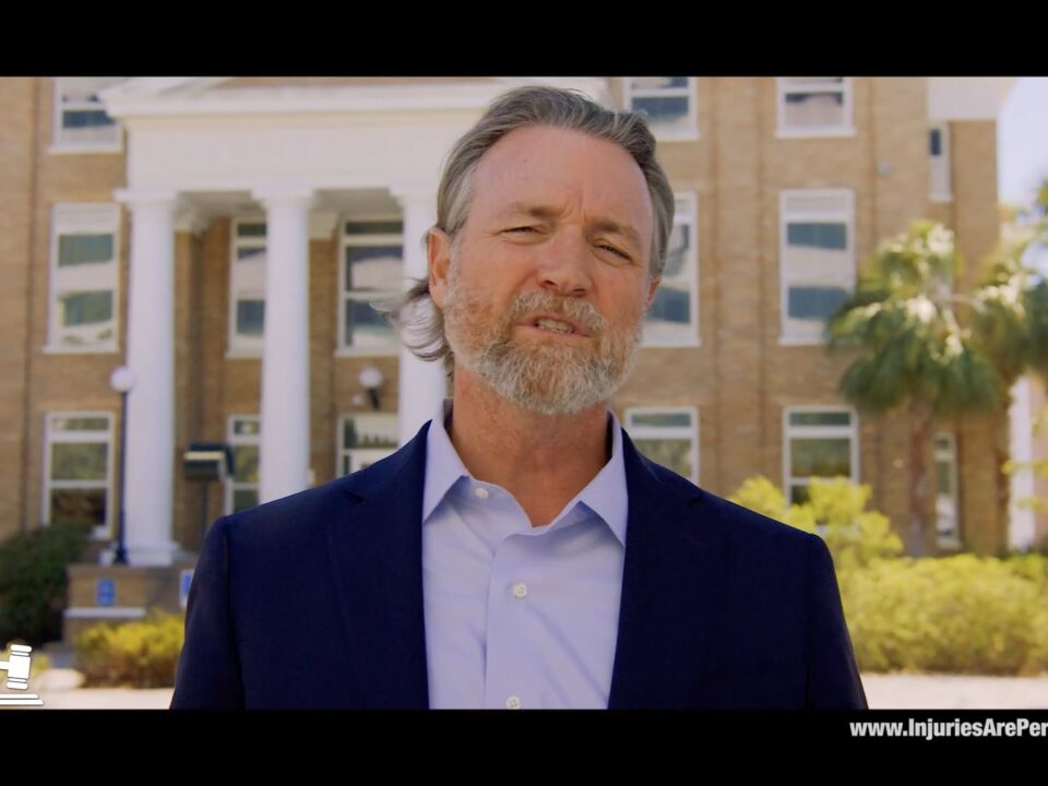 A man in front of an office