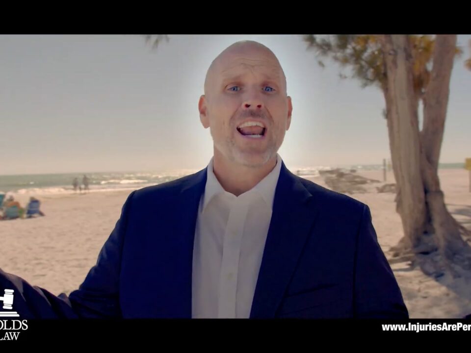 A man in a suit on a beach