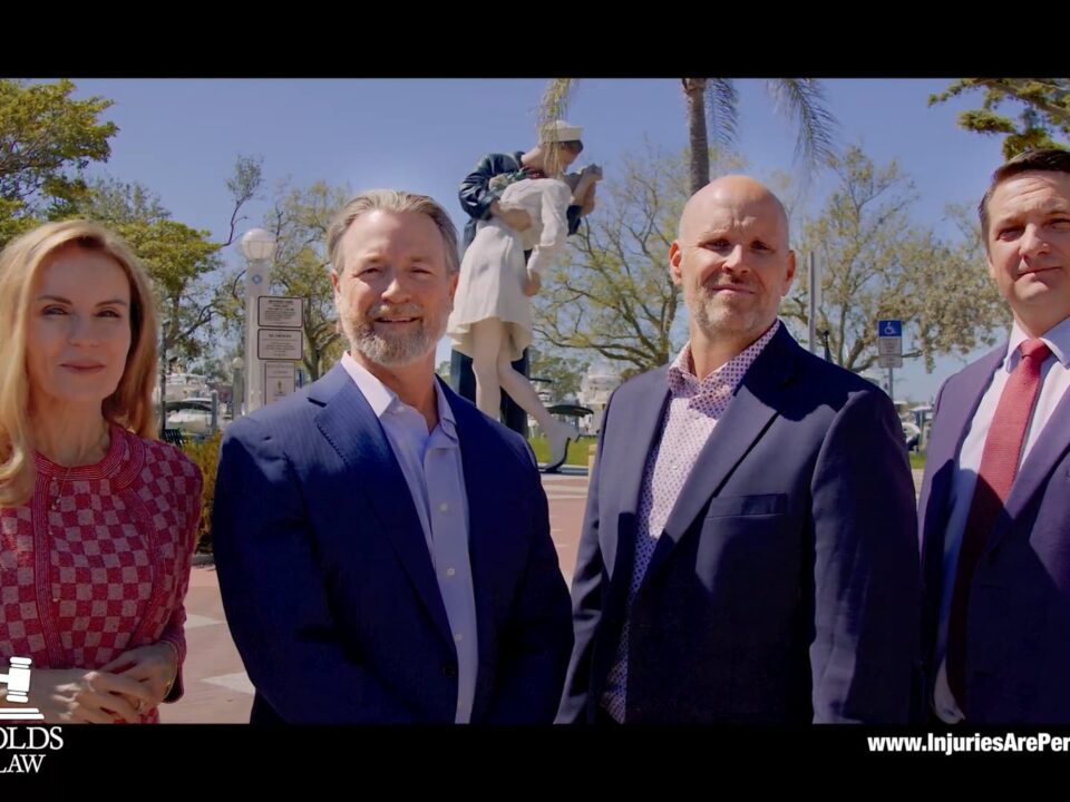 People in front of a statue