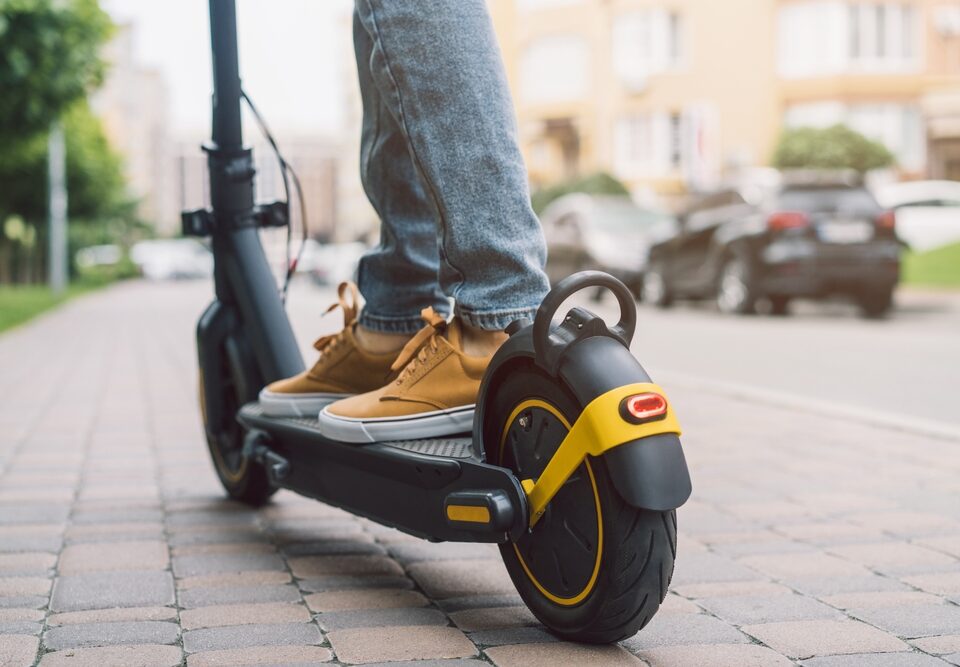 a person riding an electric scooter